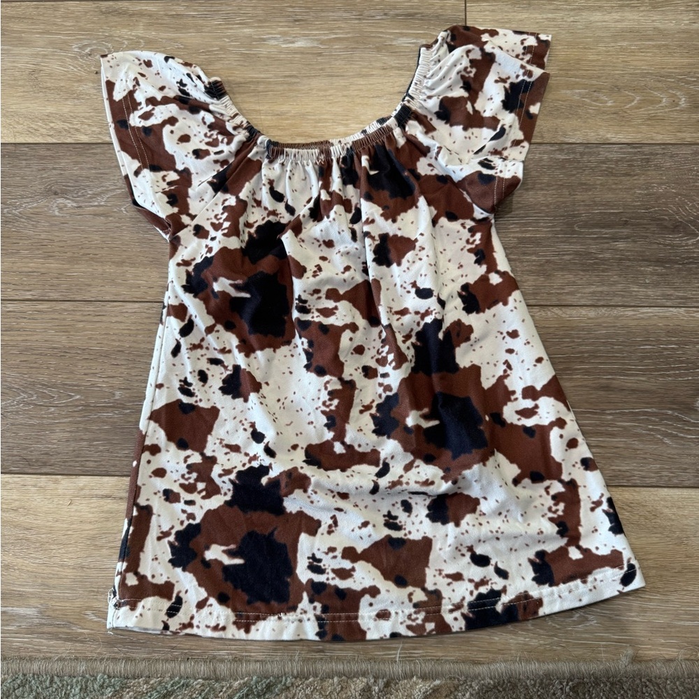 Girls cow print top